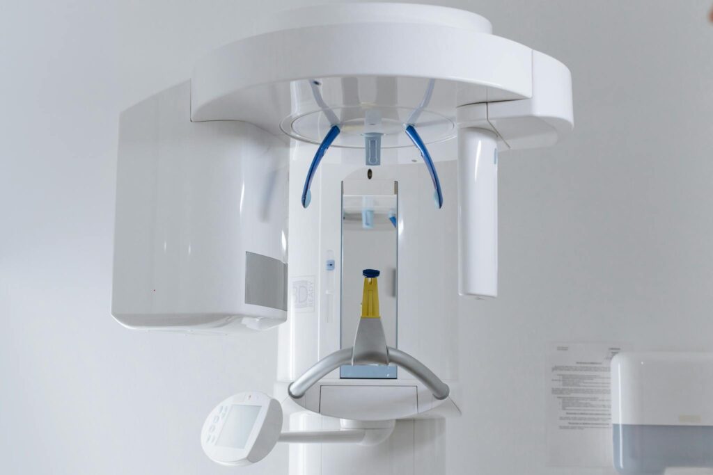 Close-up of modern dental x-ray machine in a clinic setting.